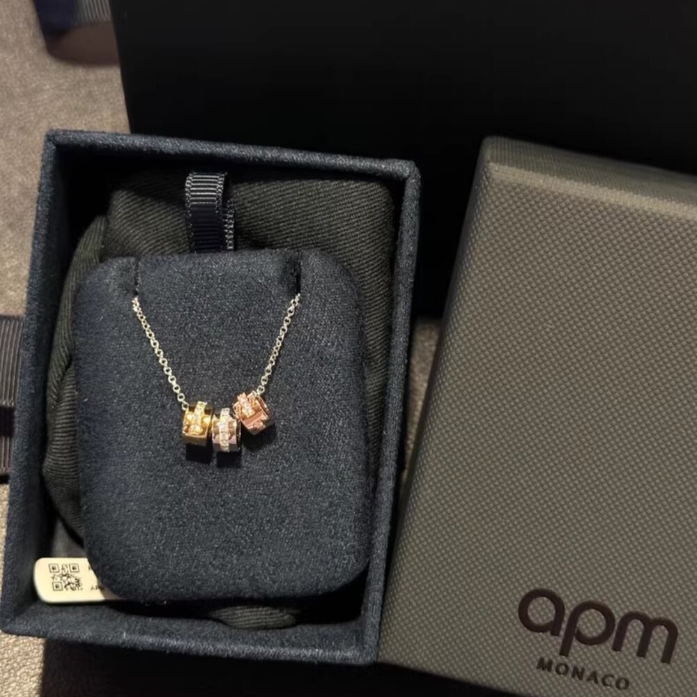 APM Monaco Gold and Rose Gold Cube Pendant Necklace